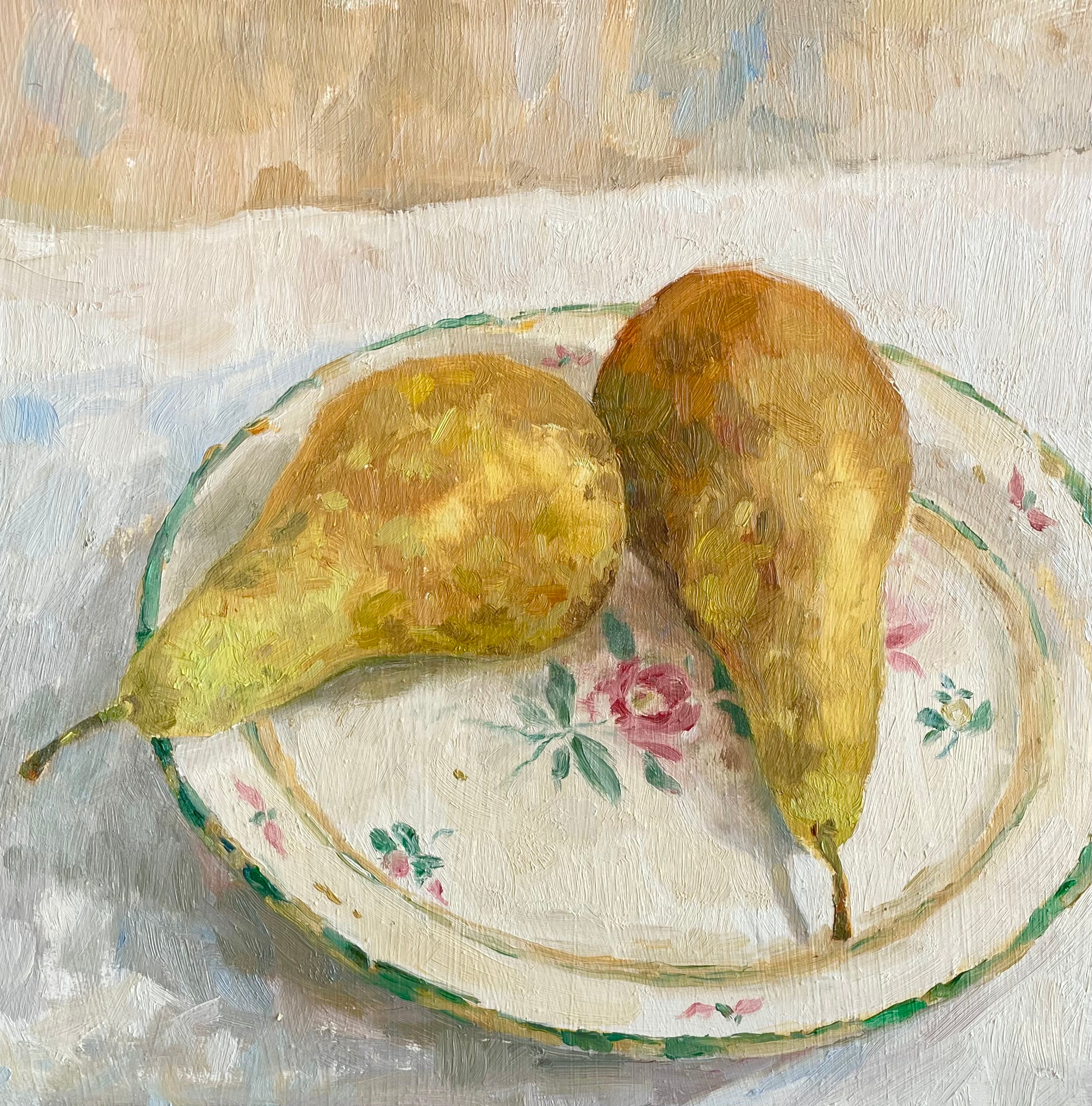 oil painting of pears on a floral plate