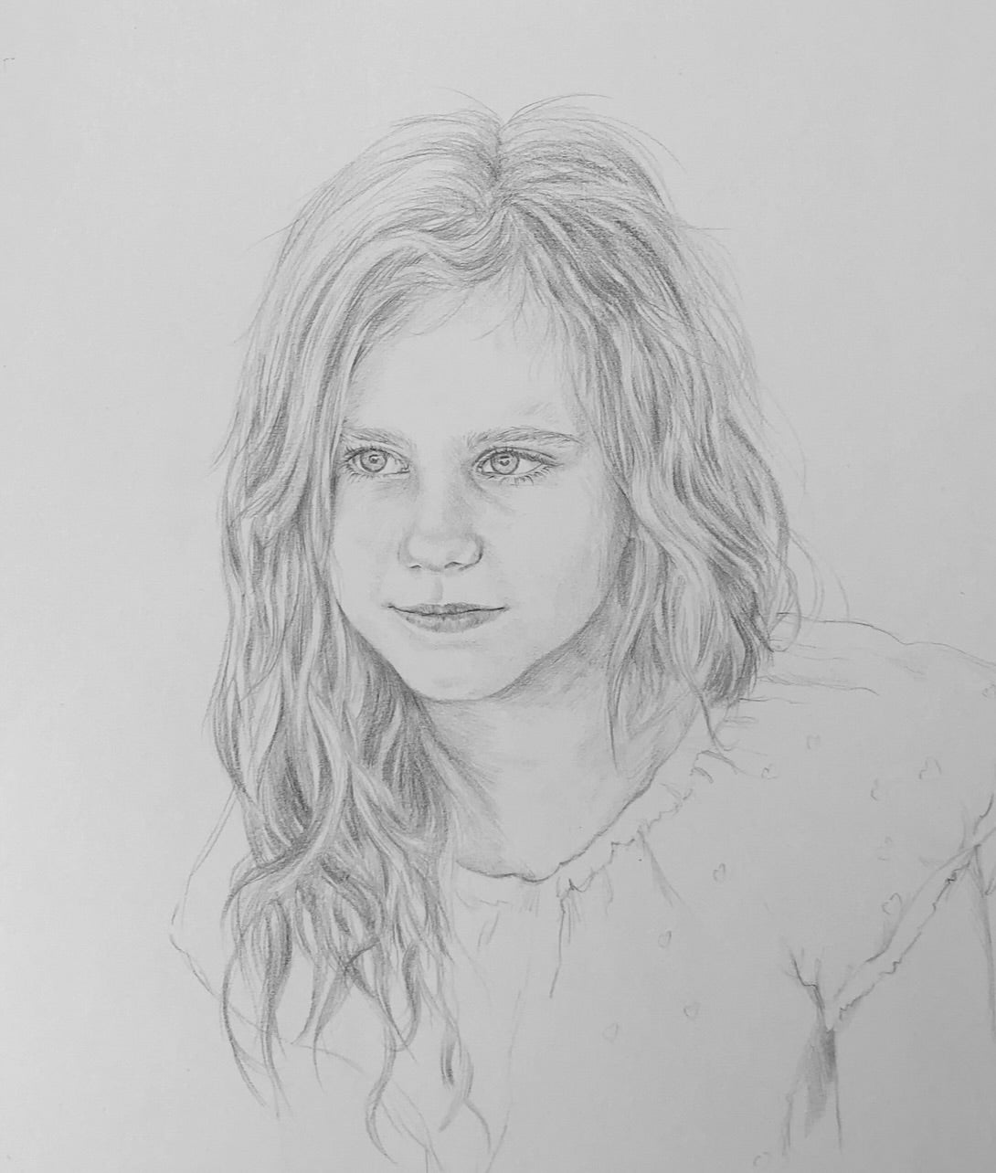 pencil portrait of a girl, head and shoulders